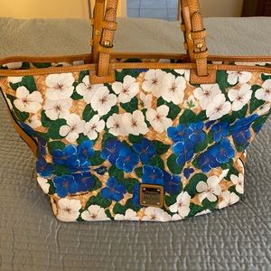 Beautiful Dooney & Bourke floral print bag. Never used- no flaws. Amazing bag!